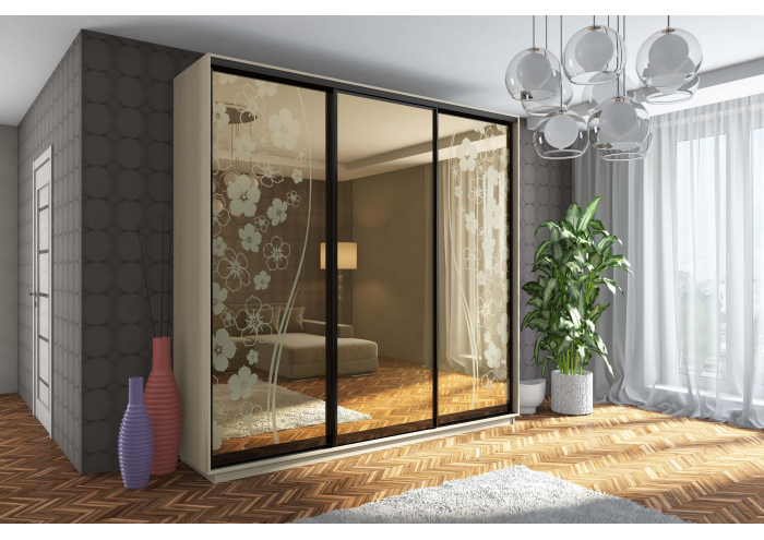 Three-door wardrobe with sliders